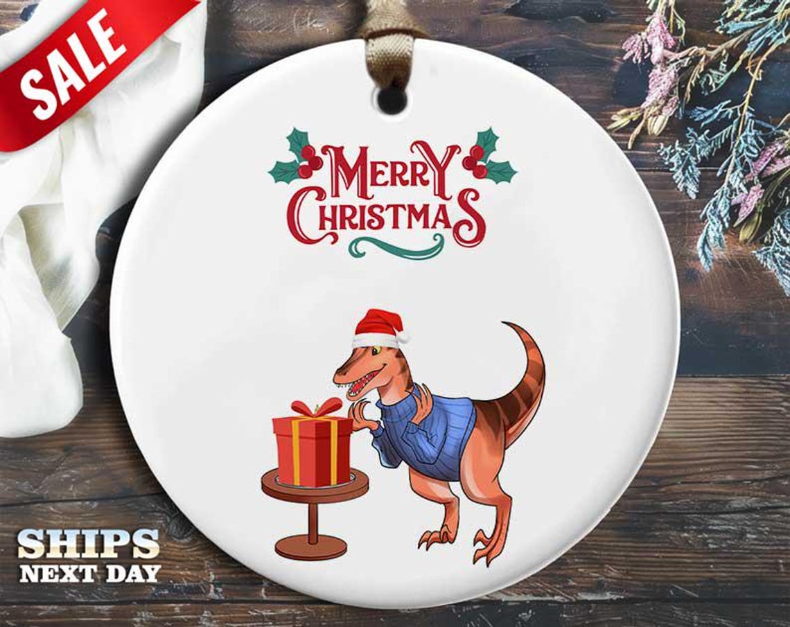 Funny Raptor Christmas Ornament - Happy Dinosaur Raptor with Christmas Hat - Humorous Animal Holiday Gift, Unique Christmas [O243]